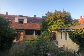 Kleine Doppelhaushälfte mit Garten und Garage