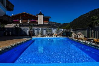 130 m² Eigentumswohnung mit Garten - Terrasse und Pool