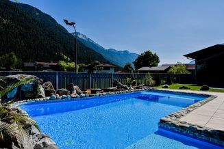 130 m² Eigentumswohnung mit Garten - Terrasse und Pool