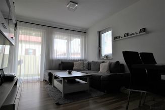 Moderne 2-Zimmer-Wohnung mit 12,50 m² Terrasse und 40 m² Eigengarten