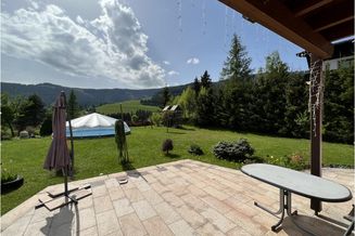 Einfamilienhaus mit Einliegerwohnung und großem Garten in einzigartiger Aussichtslage in Filzmoos!
