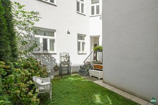 Entzückender 3,5-Zimmer-Altbau mit ca. 37 m² Eigengarten
