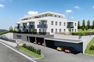 Neubauwohnung in Pollham: Bestens aufgeteilte 2-Zimmer-Wohnung mit Wintergarten, kleinem Garten und Tiefgaragenstellplatz