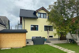Zweifamilienhaus in Essling mit Süd-Garten und Swimmingpool