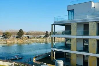 PROVISIONFREI! ERSTBEZUG! THE SHORE! 1. REIHE AM WASSER! RUHIG! HELLE 2. ZIMMER MIT 7m² BALKON! CONCIERGESERVICE! FITNESS! SPA-BEREICH! EINBAUKÜCHE.