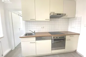 Schöne 3 Zimmer Wohnung mit Balkon &amp; neuwertiger Küche mit Geräten - in sonniger Siedlungslage nahe Zentrum