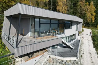 Außergewöhnliches Wohnhaus mit traumhaftem Panorama- und Seeblick auf den Ossiacher See!