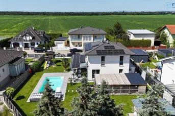 "EIN HAUS, DAS ALLE STÜCKERL SPIELT" - ENERGIEEFFIZIENTES HAUS MIT 4 ZIMMERN, SWIMMINGPOOL, RIESIGEM KELLER UND KLIMAANLAGE