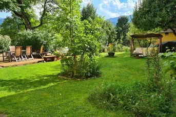 Anleger aufgepasst! Wohnhaus mit 5 Wohnungen, südseitiger Terrasse, Balkon, 2 große Gartengrundstücke u. 5 Garagen