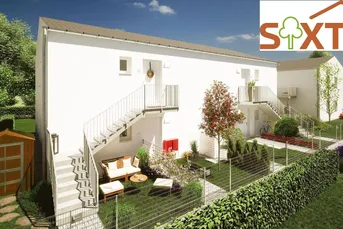 Bestpreis im Niedrigenergiehaus: 3,5-Zimmer DG-Wohnung mit Balkon, Eigengarten und 2 Parkplätzen