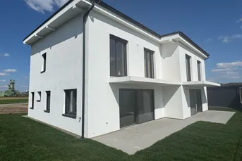 Sonnige Doppelhaushälfte mit Doppelcarport, Kellerersatzraum und großer Südterrasse!