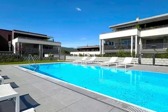 2.Seereihe! Exklusive 3-Zimmer-Wohnung mit direktem Poolzugang in Velden am Wörthersee