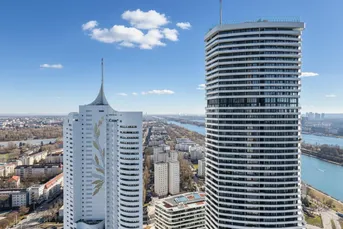 DC2 – Architektonische Klarheit, ergänzt durch eine umlaufende Loggia und einen weiten Ausblick