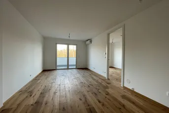 Dachgeschosswohnung mit Blick ins Grüne – stilvoll wohnen am Waldrand