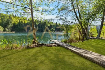 Eleganz trifft Natur – Penthouse Top 3 am Aichwaldsee mit privatem Seezugang, See- &amp; Bergpanorama