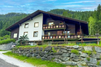 Exklusives Wohnen im Skigebiet: Charmantes Alpenhaus mit 5 Wohneinheiten &amp; Ausbaupotential