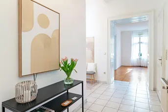 Altbau-Charme mit 3 Zimmern und Süd-Balkon in zentraler Lage