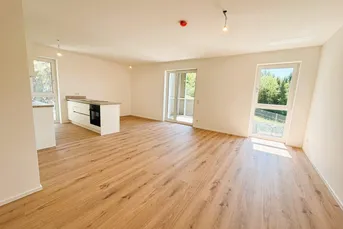Erstbezug - Geräumige 3-Raum-Wohnung mit 2 Balkonen und Einbauküche mit herrlichem Blick in die Natur! - Mietkauf