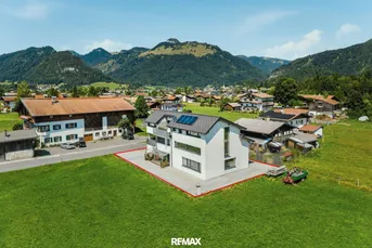 Modernes Wohn- &amp; Geschäftshaus in Bestlage von Kössen!