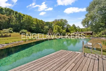 Resort-Feeling nahe Wien - hochwertige 3 Zimmer Wohnung mit Garten, Schwimmteich und mehr!