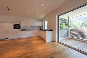 Ihr Wohlfühl-Zuhause in Niederau – elegante Wohnung mit Designküche und Balkon mit Bergblick