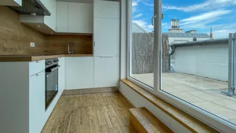 Expose DG-Maisonette mit Terrasse – Wohnen auf zwei Ebenen in ruhiger Stadtlage mit Weitblick