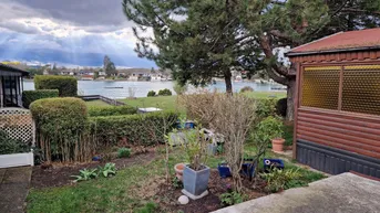Expose Badekabine mit See und Terrasse