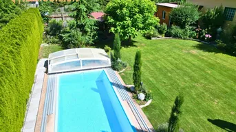 Expose Wohnen mit Mehrwert – großzügiger Gemeinschaftsgarten mit Pool inklusive
