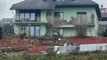 Expose Ruhige Wohnung mit schöner Aussicht und Gartenanteil