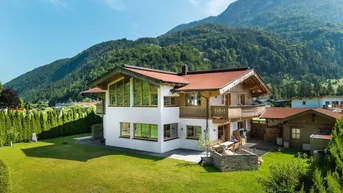 Expose Sonniges Alpenjuwel – Großzügiges Landhaus mit Einliegerwohnung