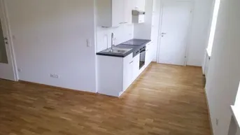 Expose Neuwertige 3 ZIMMER-Wohnung, Einbauküche, Bad mit Dusche, extra WC, Klimaanlage, nähe Hauptbahnhof!