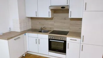 Expose 2 ZIMMER-NEUBAU + Süd-Balkon + neuwertige Einbauküche + Bad mit Wanne und Fenster + extra WC + Lift!