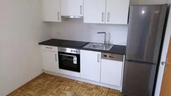 Expose Neuwertiger 2 ZIMMER-NEUBAU + großer Süd-Balkon 8,5m² + extra Küche möbliert mit Fenster + Lift!