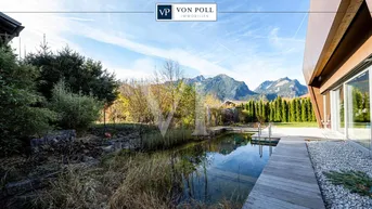 Expose Modernes Design trifft Natur - Passivhaus mit großzügigem Wohnkonzept &amp; Kamin