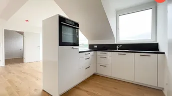 Expose Helle 2 Zimmerwohnung mit Balkon und Küche im Dachgeschoss - ERSTBEZUG