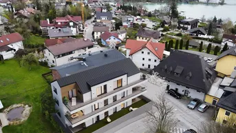 Expose Neubau mit Atterseefeeling: Neubauwohnung mit zwei sonnigen Loggien &amp; Seeblick im Zentrum von Seewalchen (Top 02)