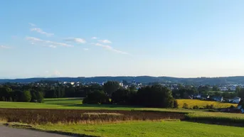 Expose Baugrundstück mit Panoramablick bis in die Salzburger Berge - 800qm Hanglage