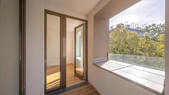 Expose Stadtoase! 2-Zimmer mit westseitiger Loggia und Parkblick