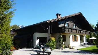 Expose Charmantes Einfamilienhaus mit großem sonnigen Grundstück und traumhaftem Bergblick