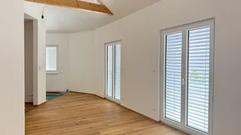 Expose Exklusive energieeffiziente Maisonettewohnung mit beeindruckender Galerie und großer Terrasse - Erstbezug