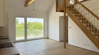 Expose Exklusive energieeffiziente Maisonettewohnung mit beeindruckender Galerie und großer Terrasse - Erstbezug