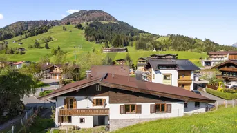 Expose Hohe Baumassendichte: Zentrumsnahes Grundstück mit Altbestand und direkter Pistenanbindung