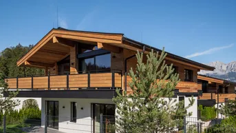 Expose Exklusive und möblierte Neubau-Chalets in Kitzbühel