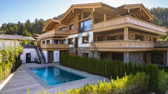 Expose Ski in / Ski out - Neubauwohnungen mit Kaiserblick &amp; Pool