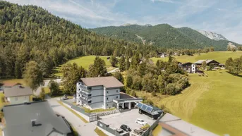 Expose Alpine Living- Ihr Investment im Herzen der Tiroler Bergwelt!