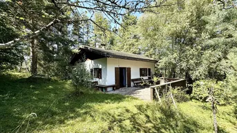 Expose Ferienhaus mit Freizeitwohnsitzwidmung in ruhiger Waldrandlage auf über 1000m² Grundstücksfläche