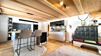 Expose Reinkommen &amp; Wohlfühlen - Prachtvolle Wohnung im Tiroler Stil mit Ski in / Ski out