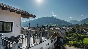 Expose Luxuriöse Penthouse-Wohnung mit Panoramablick im Stadthaus Mittersill