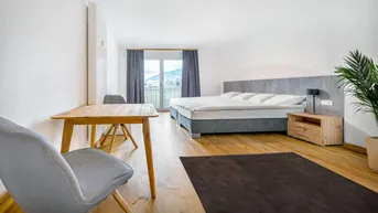 Expose Zentral gelegenes Mitarbeiterwohnhaus mit großzügigen Eigentumswohnungen