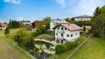 Expose Doppelte Wohnqualität mit Panoramablick: Zwei Einfamilienhäuser samt Schwimmteich in Bestlage von St. Radegund